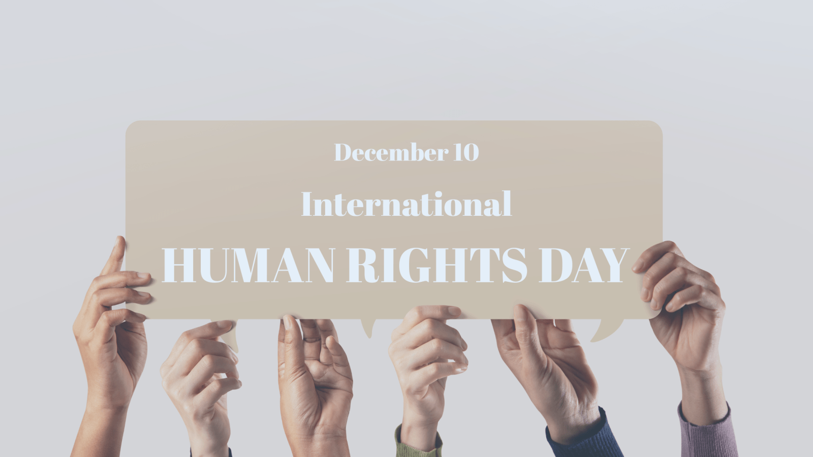 Human rights sign lifted by 6 hands of different races.