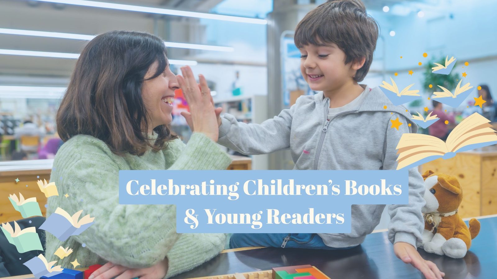 Child at the library with an adult, giving a high five celebrating books