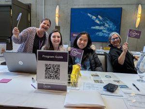 At the Decoda Literacy Conference 2026 table - Literacy Now Burnaby Volunteers