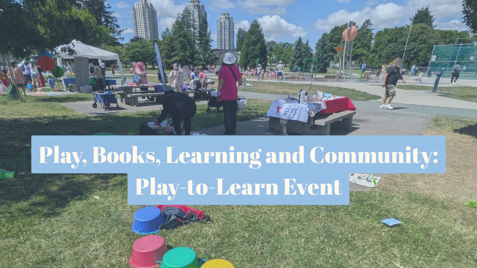 Play-to-Learn event 2026. A view of the Edmond Park with the tends, volunteers, families and children playing